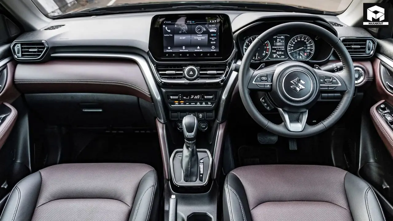 Looking to choose between Maruti Victoris and Grand Vitara? This comprehensive comparison breaks down their features, size, technology, safety, and fuel efficiency to help you decide. - right