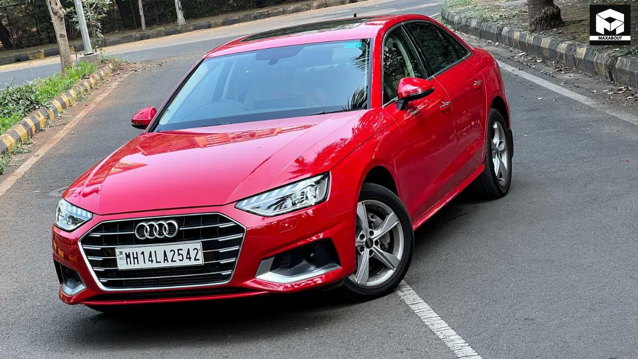 Audi India slashes prices across its lineup by up to Rs 7.8 lakh. Discover the new prices for A4, A6, Q3, Q5, Q7, and Q8 models and what this means for luxury car buyers. - foreground