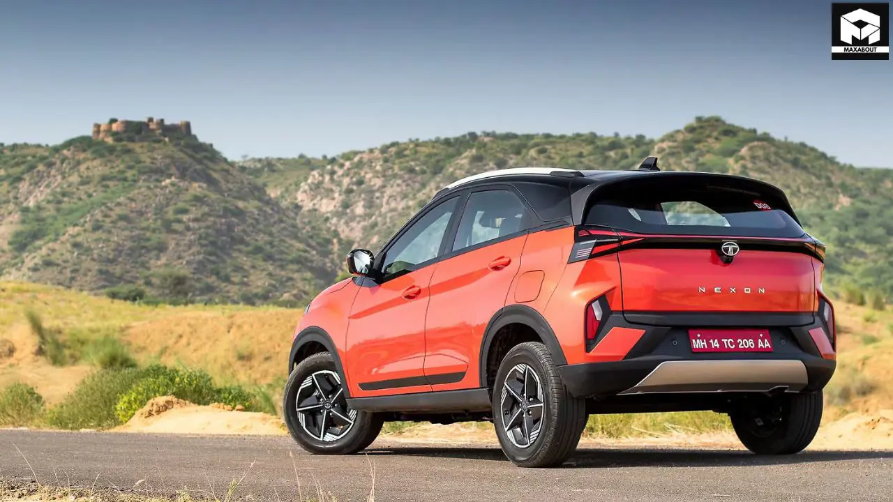 Tata Motors slashes Nexon prices by up to Rs 1.55 lakh across all 42 variants. Explore the complete variant-wise price list, features, and what this means for compact SUV buyers. - image