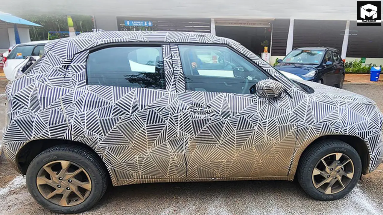 Get exclusive details on the upcoming Tata Punch facelift, featuring Altroz-inspired connected LED taillights and a 360° camera system. Here's what to expect from Tata's refreshed micro-SUV. - bottom