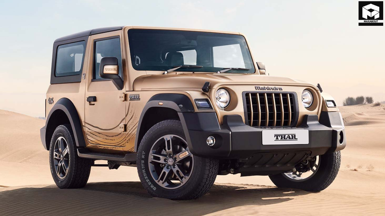 Get an exclusive first look at the 2025 Mahindra Thar 3-Door spotted at dealer yards ahead of its official launch. Discover features, specs, and expected pricing. - angle