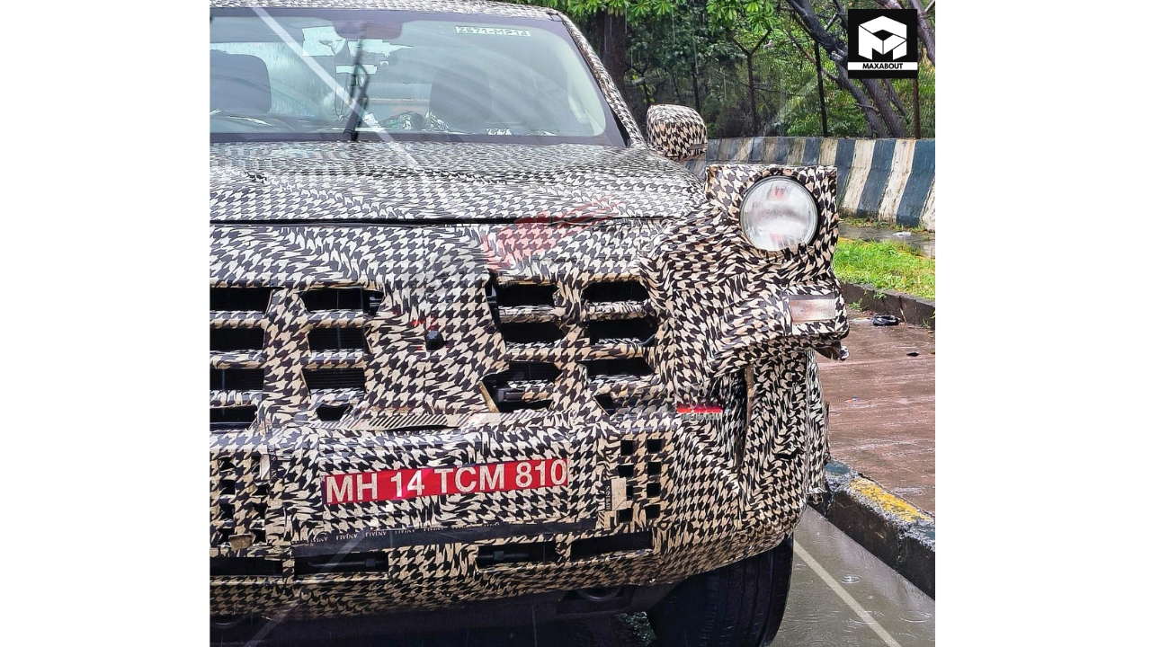 Compare the 2026 Mahindra Scorpio N Pickup and Toyota Hilux in our comprehensive load testing analysis. Discover which truck delivers better payload capacity, towing strength, and value. - portrait