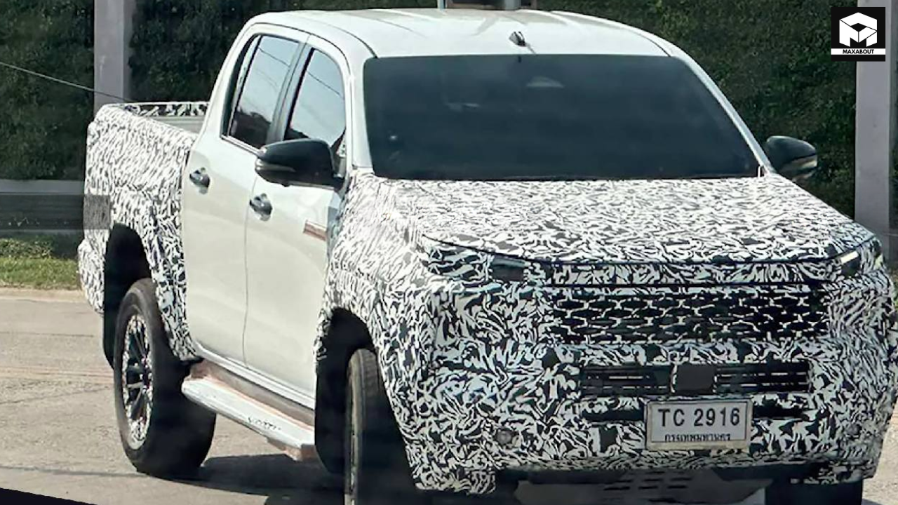 Compare the 2026 Mahindra Scorpio N Pickup and Toyota Hilux in our comprehensive load testing analysis. Discover which truck delivers better payload capacity, towing strength, and value. - pic