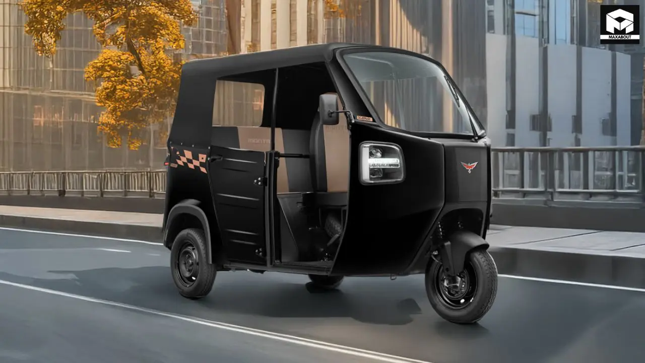 Discover the newly launched Montra Super Auto electric 3-wheeler with 160 km range, advanced features, and Black Edition variant priced at Rs 3.79 lakhs. - left
