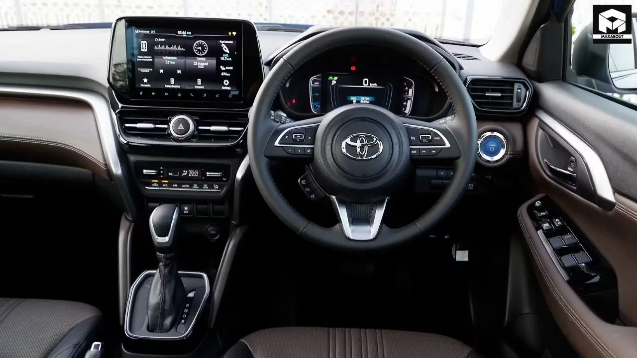 Discover the exclusive Toyota Hyryder Signature Edition with dealer modifications including hydro dipped elements, dual-tone interiors, and eye-catching yellow brake callipers. - photo