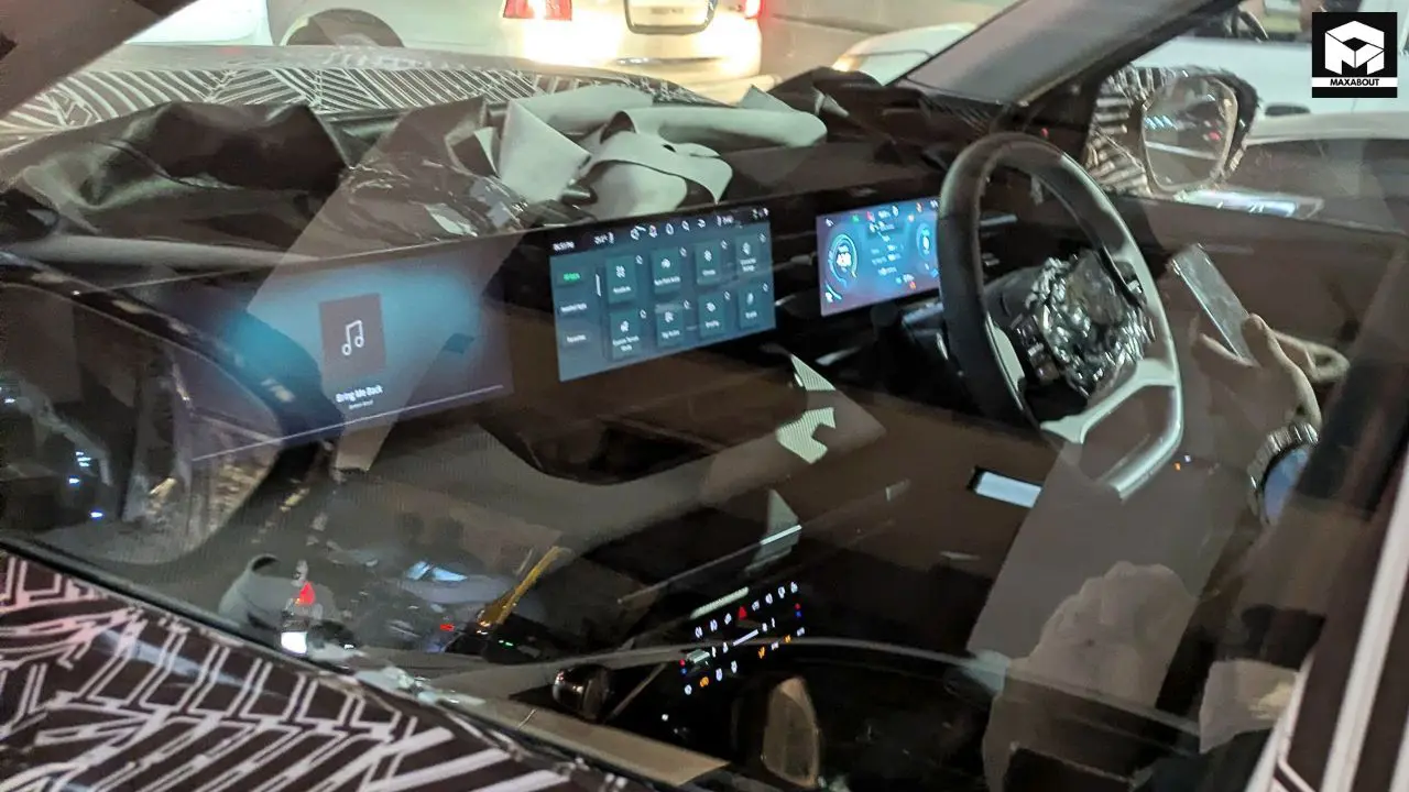 Get an exclusive look at the new Tata Sierra's interior featuring a triple screen layout, premium dashboard, and luxurious amenities that position it as a high-end SUV. - background
