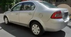 Ford Fiesta (2010) 1.4 Duratorq SXI Rear 3-Quarter View