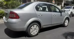 Ford Fiesta (2010) 1.4 Duratorq SXI Right Rear 3-Quarter View