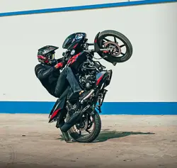 Bajaj Pulsar 150 Twin Disc Action Shot 1