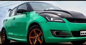 Maruti Swift Gloss Emerald Wrap by Knight Auto Customizer