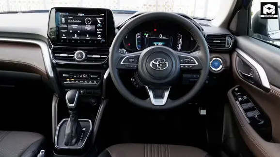 Discover the exclusive Toyota Hyryder Signature Edition with dealer modifications including hydro dipped elements, dual-tone interiors, and eye-catching yellow brake callipers. - photo