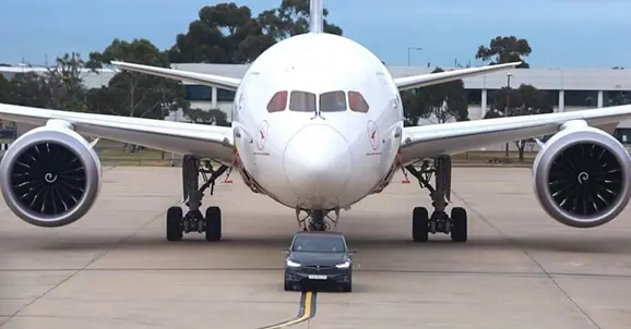 Tesla Model X Tows a Boeing 787